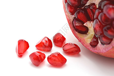 特写白色的石榴种子美食食物热带紫色团体甜点红色粉色药品水果图片