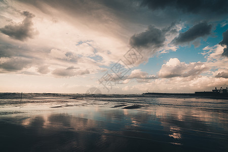 反射海浪风景热带支撑日落波浪海岸天空海岸线海洋图片