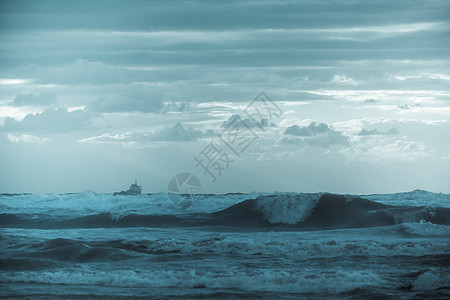 风景海浪支撑海滩天空波纹天气日落戏剧性海洋蓝色风暴图片