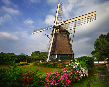 荷兰阿姆斯特丹风车农场蓝色地标农村橙子池塘活力旅行旋转旅游图片