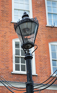 原伦敦燃气灯历史性英语建筑学灯笼邮政煤气灯金属路灯地标天空图片