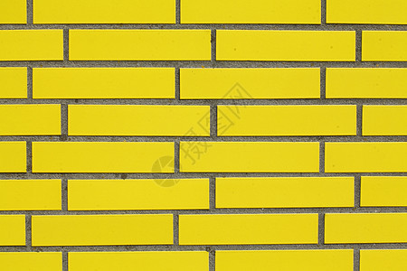 黄墙石头砖墙黄色砖块石墙积木混合物关节房子建筑背景图片
