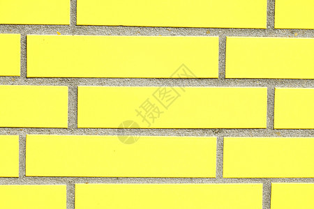 黄墙砖墙混合物关节石墙房子黄色砖块建筑石头积木背景图片