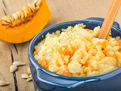 加南瓜闭合的米粉粥食物饮食橙子生长谷物美食葫芦早餐午餐勺子图片