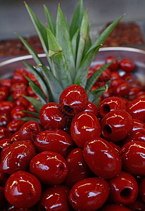 红钻油的塞里尼奥拉橄榄油特写市场小吃美食美味食物菠萝蔬菜零售活力红色背景图片