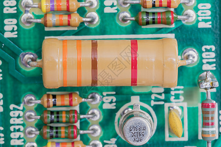 电路板上的冷凝器和阻力组装制造业芯片微电路木板电感电路打印绿色电阻器电容器图片