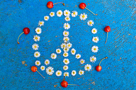 和平标志和平象征和平符号 蓝背景的和平设计自由雏菊反战图片
