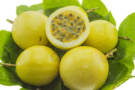 白底孤立的黄色激情果实提取叶子黄色背景健康白色异国绿色果汁饮食水果图片