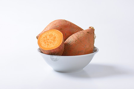 红薯凉粉甜土豆根橙子根菜块茎食物密封蔬菜背景