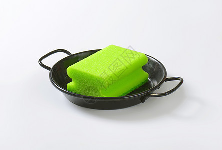 餐具上的厨房用海绵炊具擦洗工具黑色平底锅绿色煎锅图片