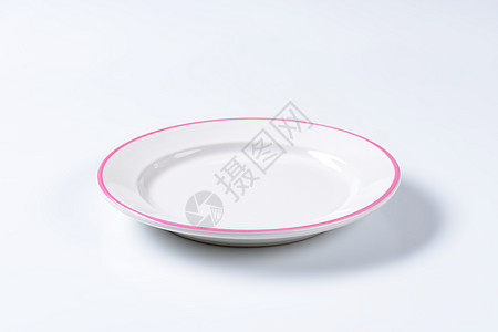 清空的餐盘陶器白色圆形石器镶边粉色制品餐具陶瓷盘子图片