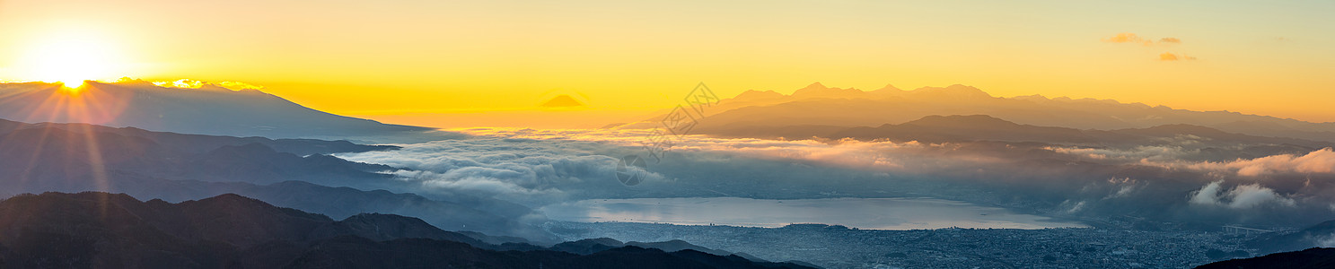 藤山日出旅行城市全景薄雾精神火山星星公吨顶峰风景图片