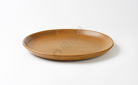 圆褐色餐盘餐具拼盘陶器陶瓷制品圆形菜盘棕色盘子图片
