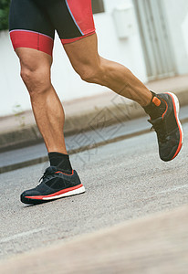 男运动员跑在街上动机运动装成人跑步行动活动慢跑者速度运动竞赛图片