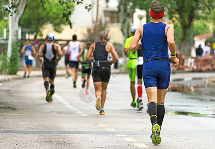一群马拉松赛跑者在街上娱乐跑步城市挑战耐力速度活力跑步者行动闲暇图片