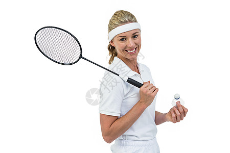 羽毛球玩家握着羽毛球拍和穿梭孔雀力量姿势专注活动活力游戏运动员女性运动锦标赛图片