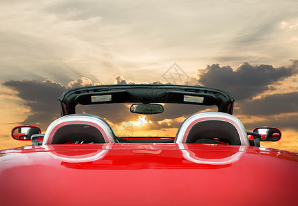 日落的红车背景图片
