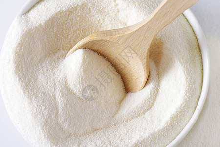 全奶粉白色勺子高架粉末乳制品脱脂奶油营养牛奶食物图片