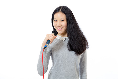 有麦克风的中国青少年演员女性明星女孩唱歌女士卡拉ok白色音乐歌手图片