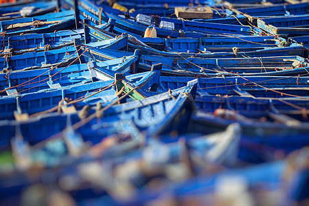 索维拉摩洛哥非洲的蓝色渔船舰队季节渔业码头木头男人男生船长旅游绳索图片