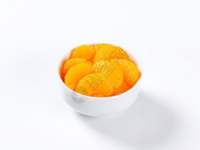 中日文橘子食物水果罐装片段柑桔瓷碗白色罐头背景图片