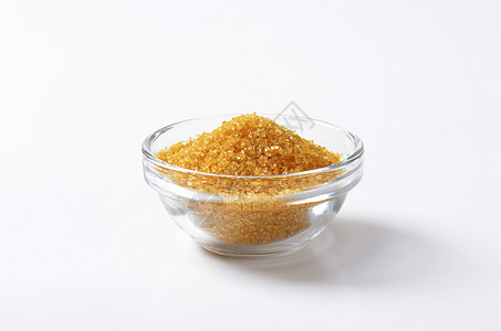 金棕色原甘蔗糖食物生食红糖水晶蔗糖背景图片