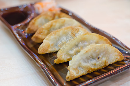 Gyoza 古约扎油炸美食盘子蔬菜大豆饺子白色食物午餐猪肉图片