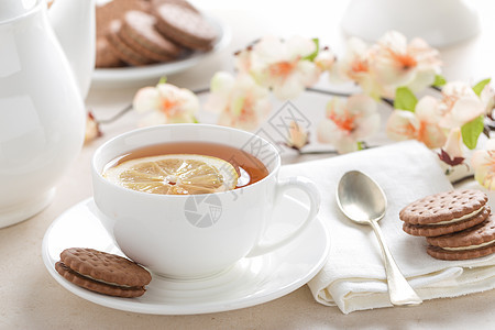 白背景的柠檬茶杯茶碗食物草本早餐液体饮料白色桌子图片
