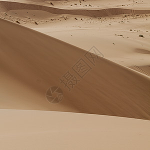撒哈拉沙漠中的沙丘Morocc场景阳光天空蓝色爬坡海浪旅行冒险风景地平线图片