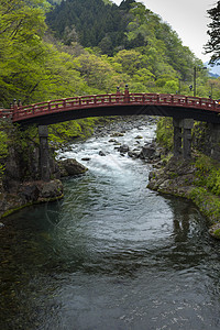 红圣桥新京在教科文组织日本Nikko网站文化爬坡道地区世界旅行遗产风景悬崖旅游游客图片