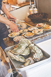 日本市场上销售的原生海产食品贝类海洋螃蟹庆典海鲜钓鱼美食鲭鱼产品店铺图片