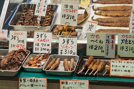 日本京都的传统粮食市场情调烹饪摊位文化异国小贩商务美食饭团午餐图片
