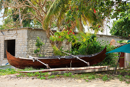 马达加斯加诺西贝海滩上的双体船海岸线热带海岸渔夫支撑天堂手工土著旅行钓鱼图片
