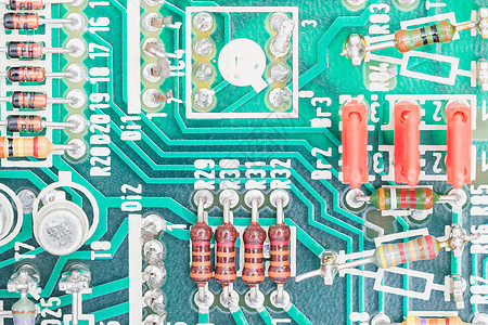 电路板上的冷凝器和阻力组装微电路电脑电气半导体绿色宏观硬件芯片电路电阻器图片