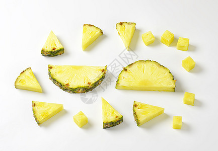 新鲜菠萝切片和网水果热带楔子高架情调绿色食物异国黄色小吃图片