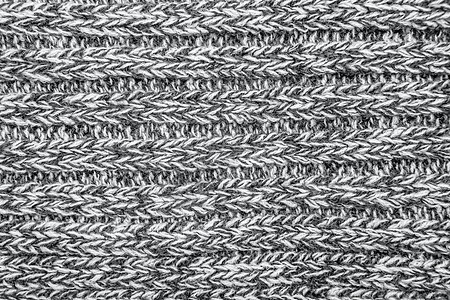 混色编织线毛衣或围巾作为背景衣服材料白色手工针织肋骨纺织品纤维羊毛织物图片