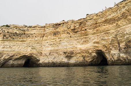 Benagil海滩洞穴 葡萄牙阿尔加夫太阳荒野地质学地标海景海岸日落全景海浪石头图片