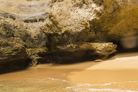 Benagil海滩洞穴 葡萄牙阿尔加夫晴天太阳岩石海洋海岸蓝色旅行日落假期反射图片