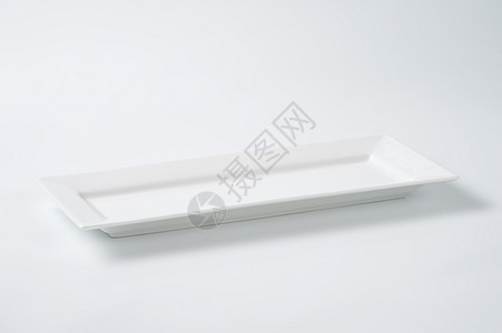 白色矩形板托盘陶瓷盘子制品镶边长方形陶器餐具菜盘图片