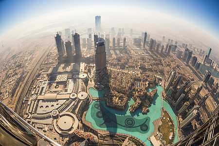 迪拜鸟瞰从阿拉伯联合酋长国迪拜哈利法塔鸟瞰迪拜市中心旅游地标街道建筑喷泉天际全景景观市中心场景背景