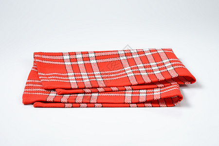 检查了红餐巾和白餐巾纸桌布折叠红色纺织品白色棉布织物图片
