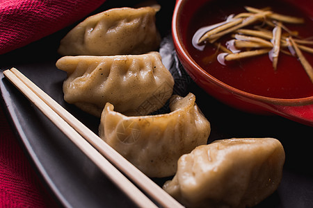 饺子筷子油炸猪排水饺饺子盘子筷子白色食物蔬菜美食大豆猪肉背景