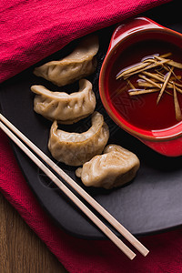 油炸猪排美食猪肉蔬菜饺子筷子盘子大豆水饺食物白色图片