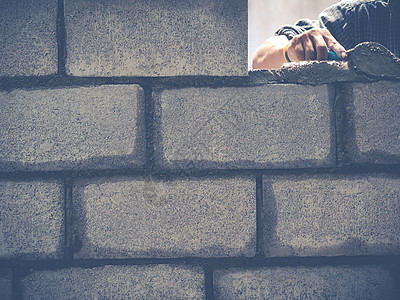 砖砖建工是建筑墙壁瓦工工人男人建筑学石匠砖块建设者石工工匠房子图片