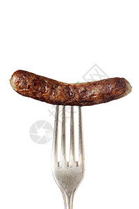 叉子上的纽伦堡香肠炙烤油炸白色营养刀具猪肉烧烤食物图片