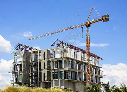 建筑大楼脚手架进步城市房子石头建筑物机器商业建造木板图片