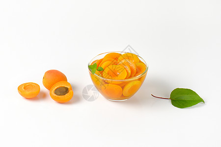 一碗杏子酱罐头罐装食物糖浆玻璃水果甜点图片