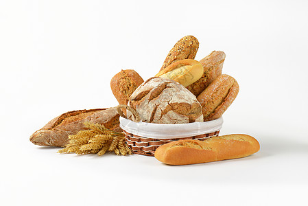 各种类型的面包篮子白色痛苦食物馒头棒子团体播种谷穗静物图片