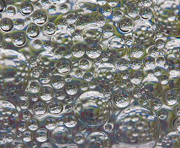 块状玻璃泡水滴窗户气泡蓝色反射液体玻璃墙纸镜子圆圈图片