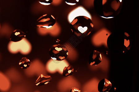 红心上油滴背景摘要关于红心下油的概述黑色液体红色水滴气泡宏观图片